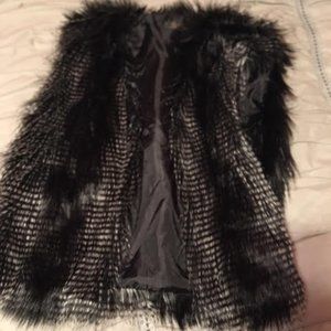 NWOT black furry vest with white